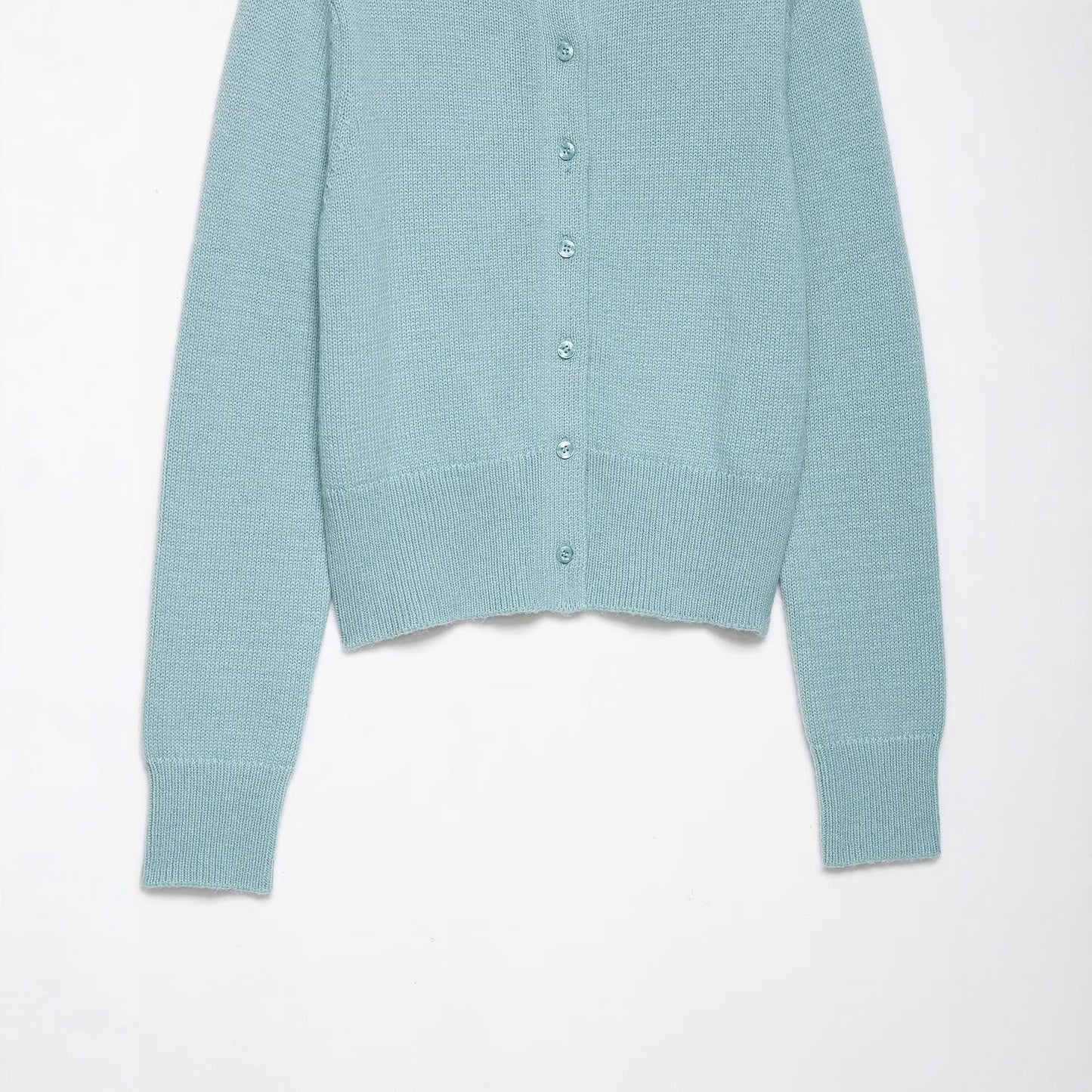 Round neck single breasted solid color knitted sweater top for women