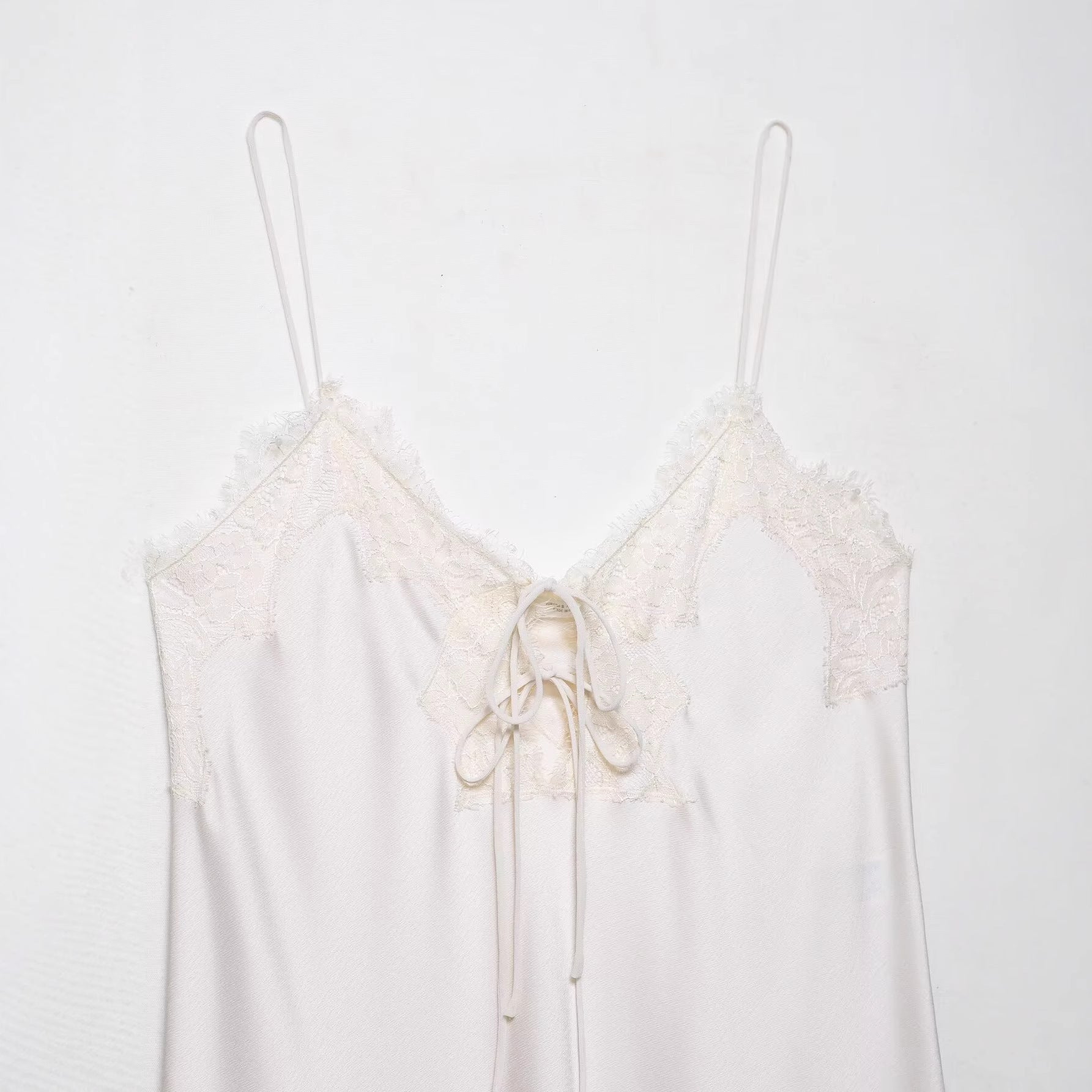 V-neck sleeveless lace up suspender white dress for women