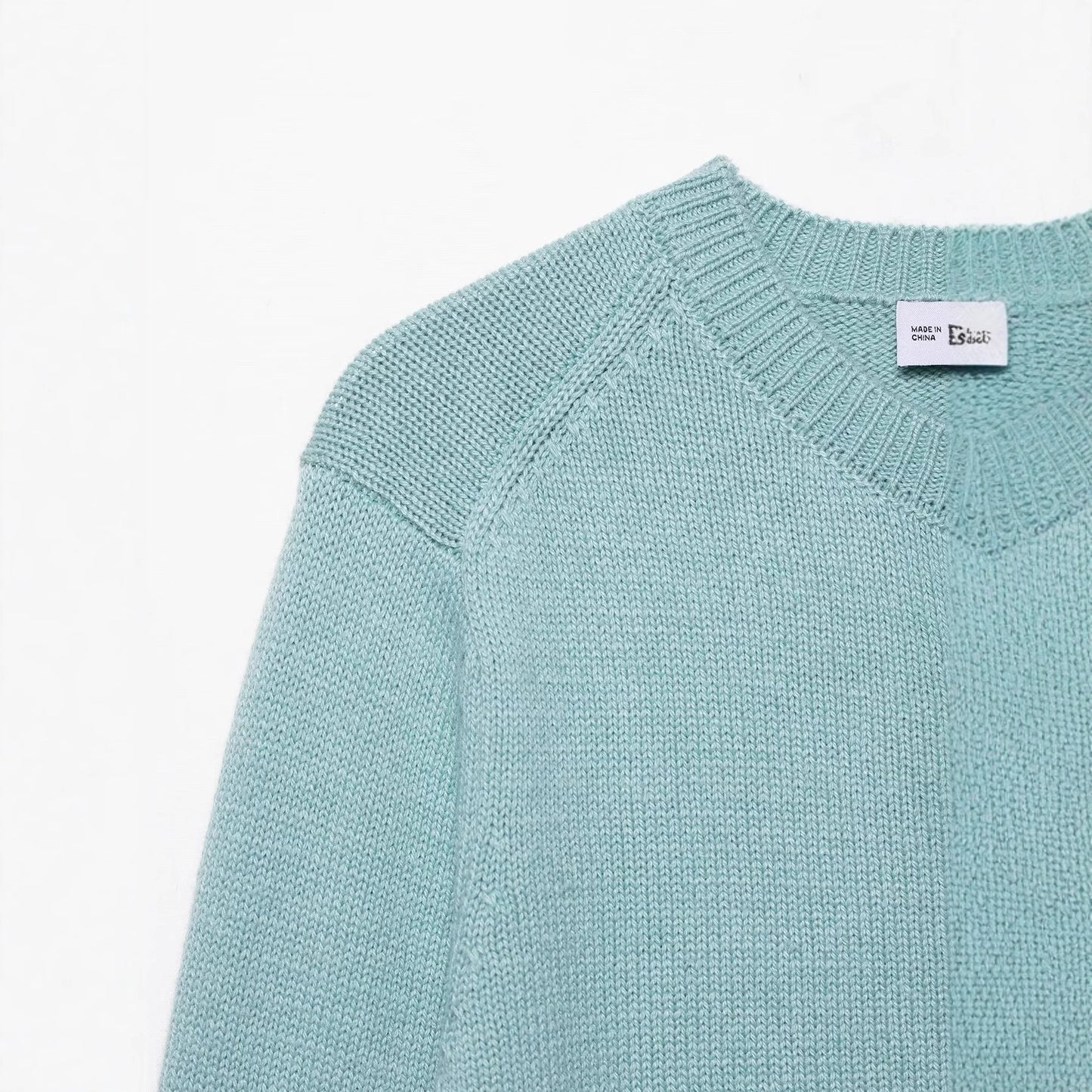 Round neck single breasted solid color knitted sweater top for women